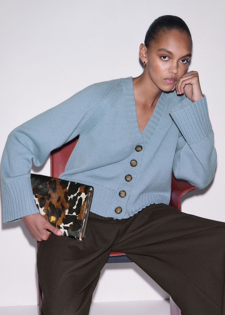 Layered knitwear styled for modern everyday dressing
